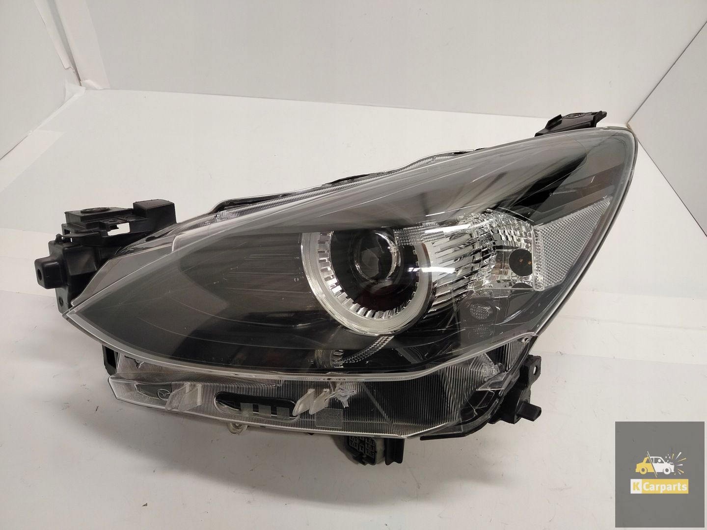 D43N-51040, Mazda 2 III Dj Lift Full Led M6 Zwart 1 Lampglas links