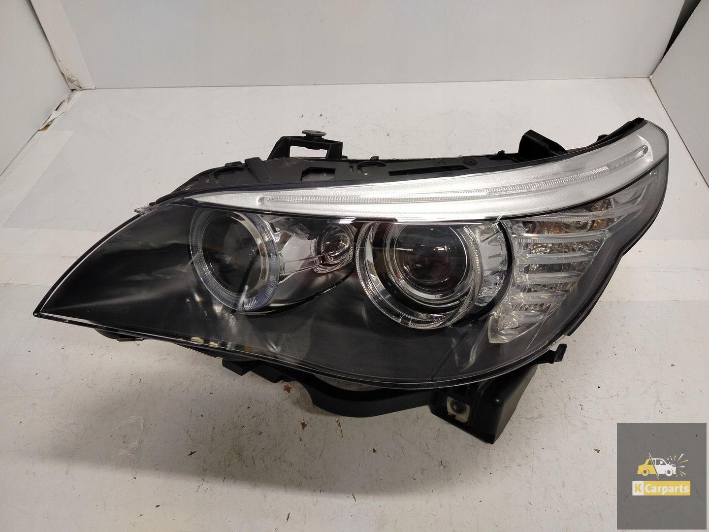 7177739, BMW E60 Lift Xenon Geen Torsie linker lamp