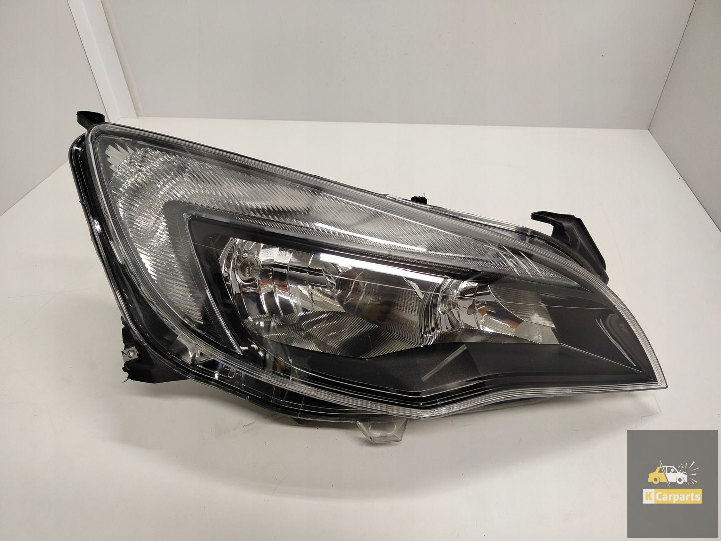 1EG010011, Opel Astra IV J Ruit Donker Glad Rechterlamp