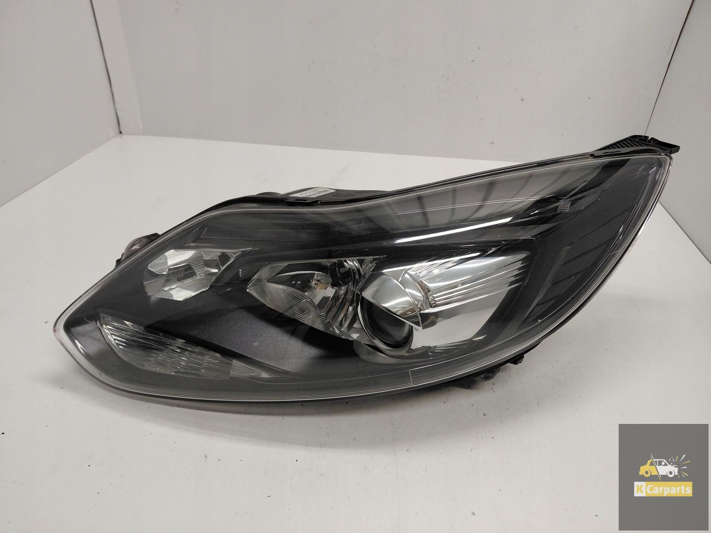 BM51-13D155-GC, Ford Focus MK3 Xenon zwart CI donker linkerlamp