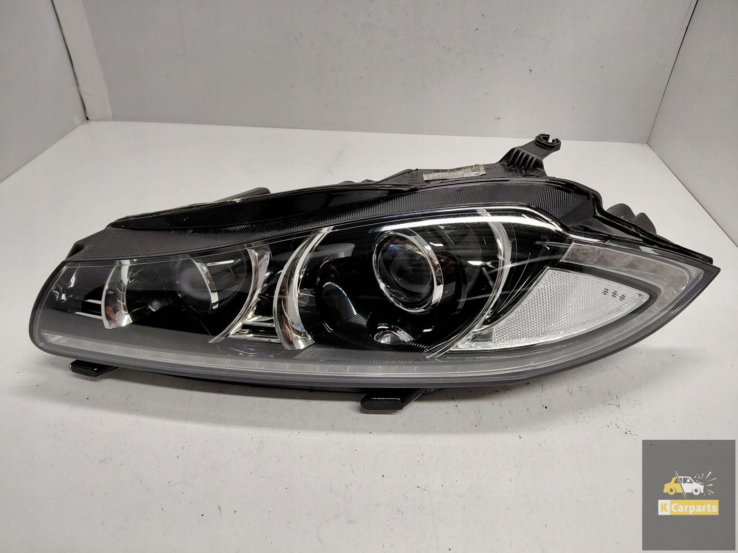 CX23-13W030-EG, Jaguar XF I Lift Xenon No Torsion left lamp