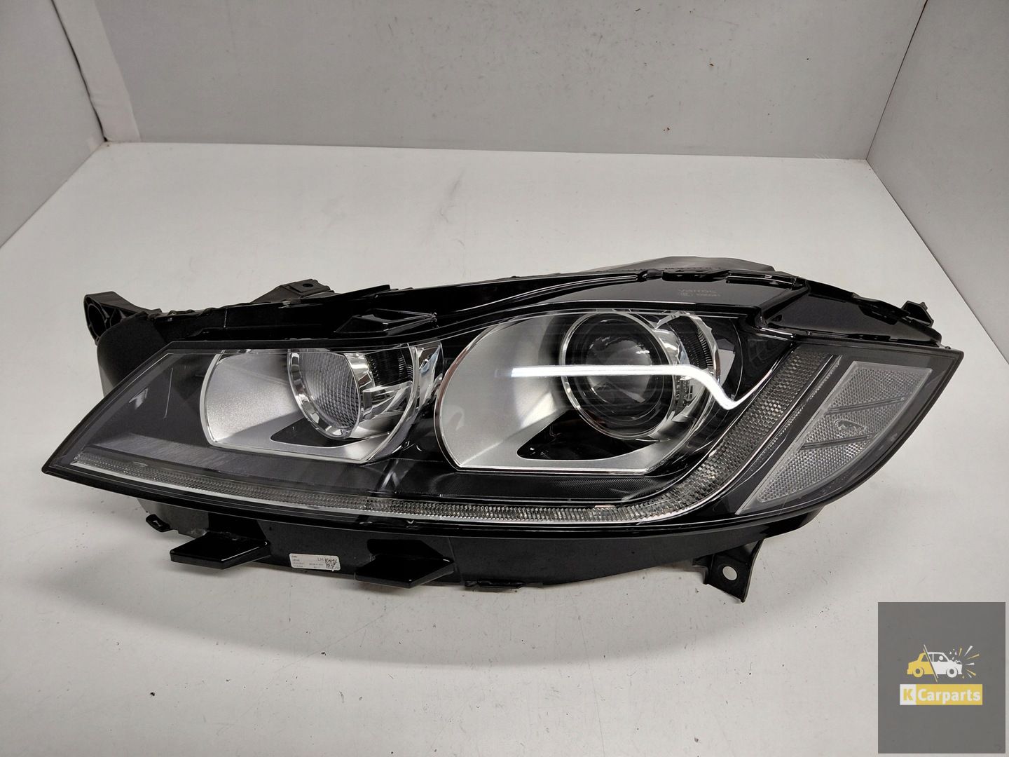 GX63-13W030-EJ, Jaguar XF II F-Pace Xenon lamp links Perfect