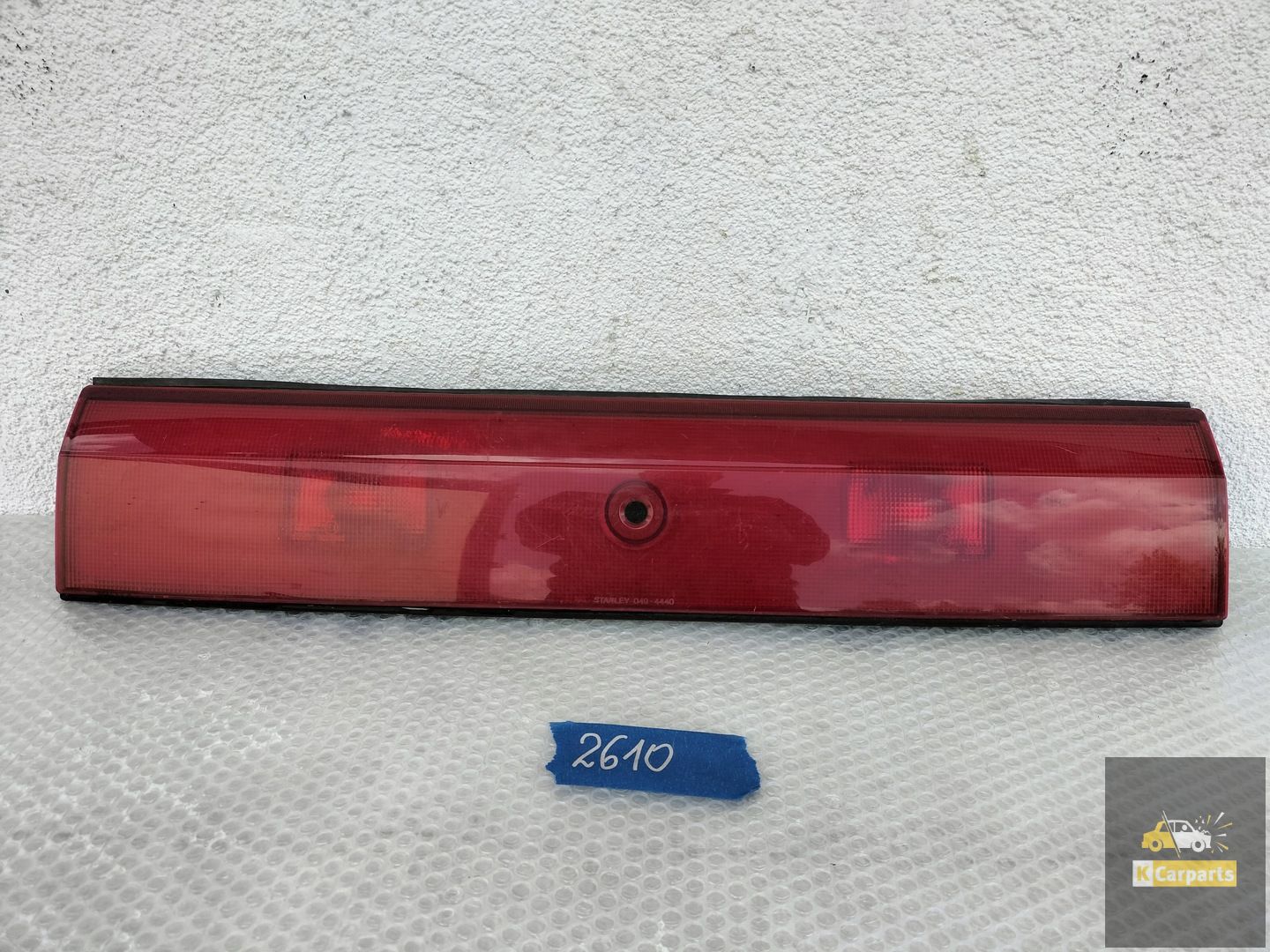 0494440, MAZDA 323 ACHTERKLEP DEKSEL 0494440