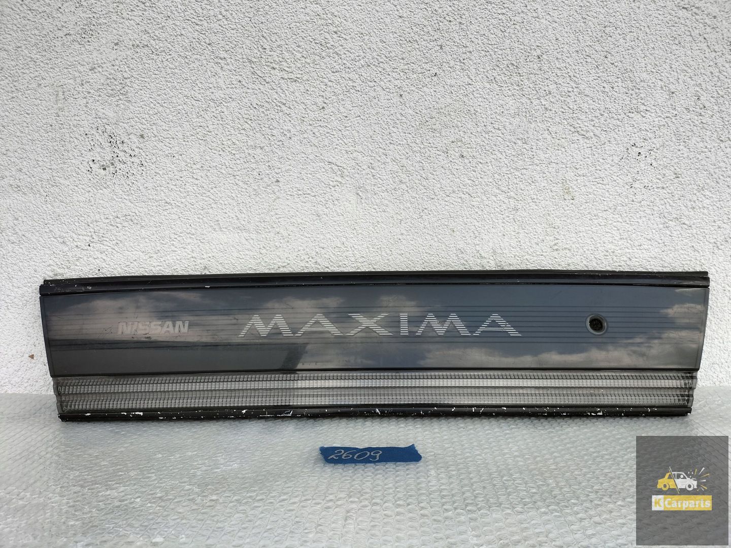 NISSAN MAXIMA ACHTERKLEP KNIPPERLICHT