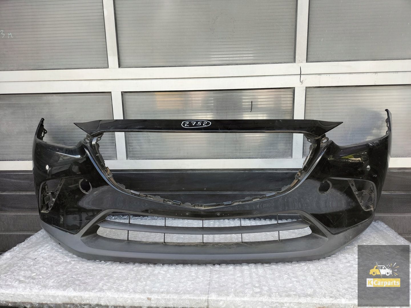 MAZDA CX3 VOORBUMPER DK8A50031