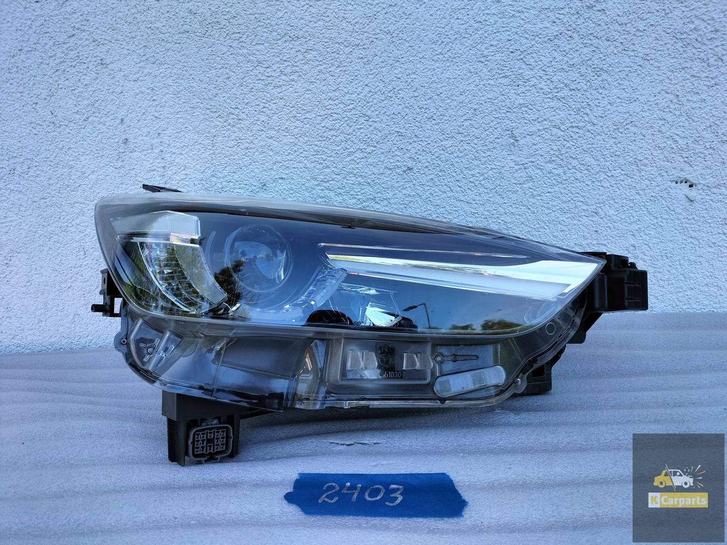 MAZDA CX3 KOPLAMP RECHTS 10 PIN D10E51030