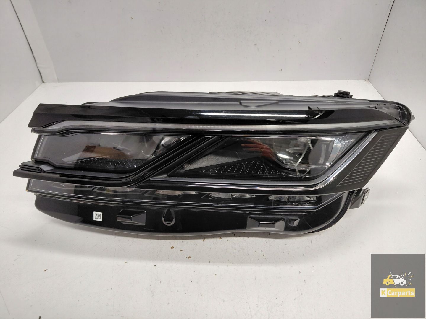 761.941.081.A, Ampoule gauche noire pour VW Touareg III Matrix R Line, en parfait état