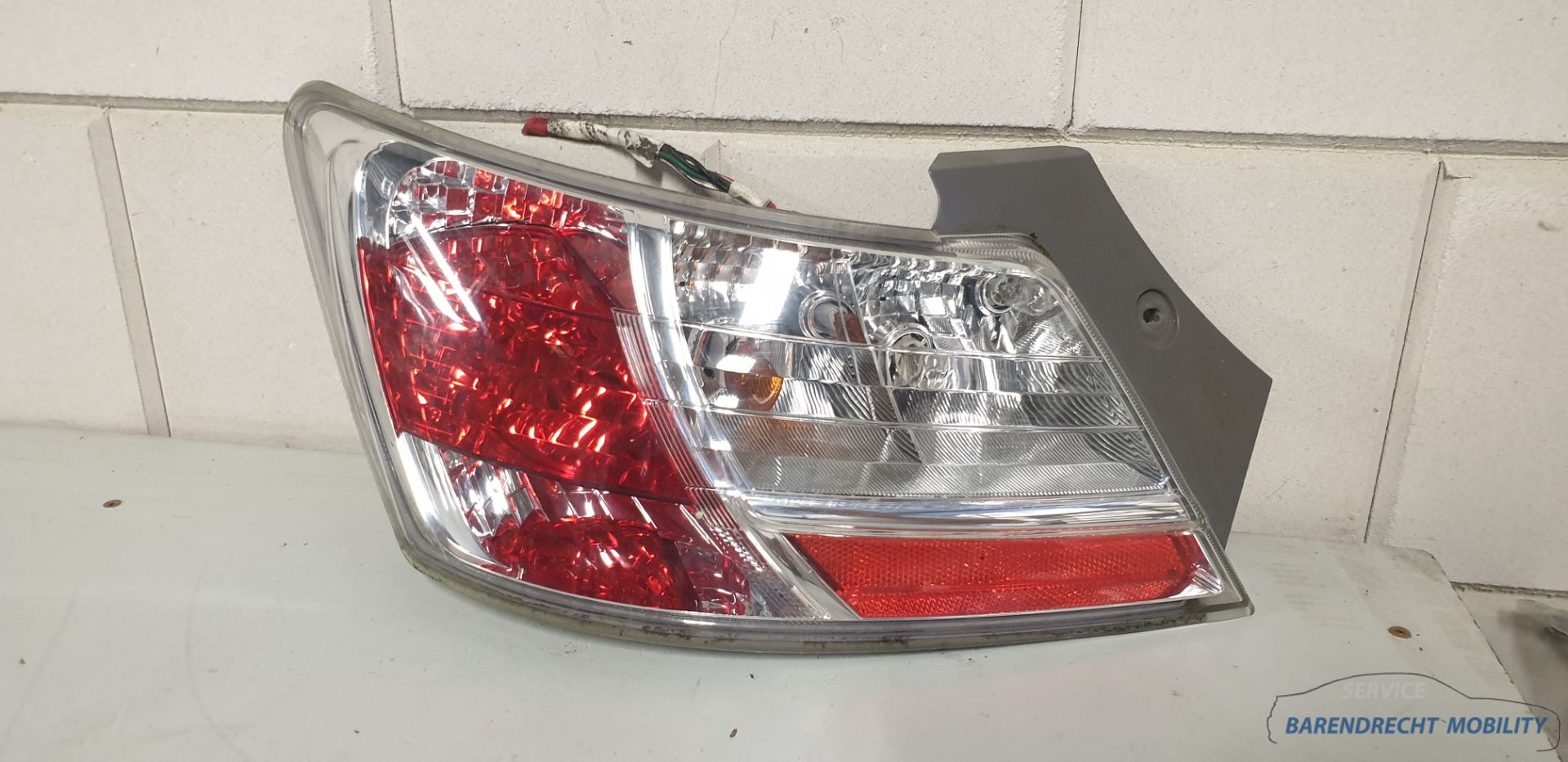 Daihatsu Materia Feu arrière gauche côté conducteur original 220-51858 état soigné utilisé 2006 2007 2008 2009 2010 2011 BARENDRECHT MOBILITY SERVICE