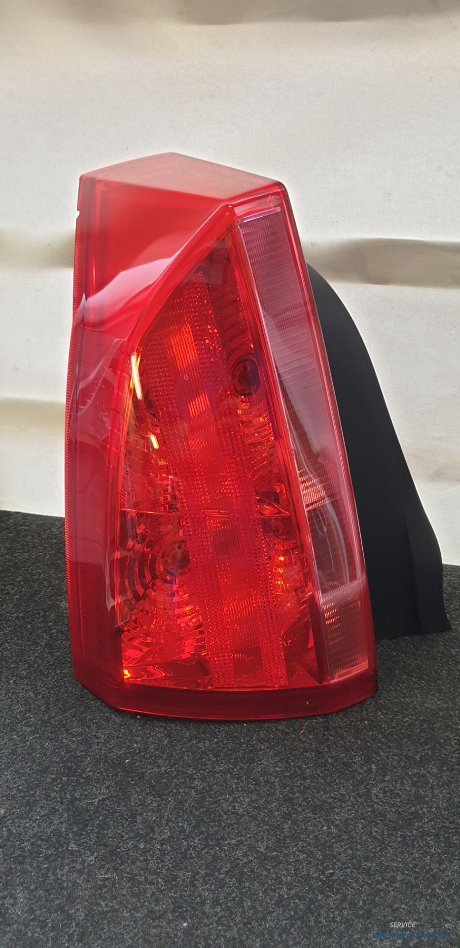 Rear light left Cadillac BLS sedan 67757971 original used 2006 / 2010