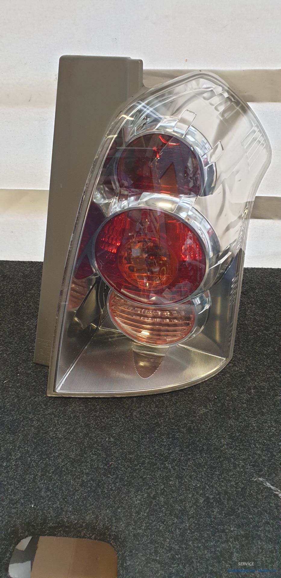 Rear light Toyota Corolla Verso right 81551-0F020 passenger side original used 2004 / 2010
