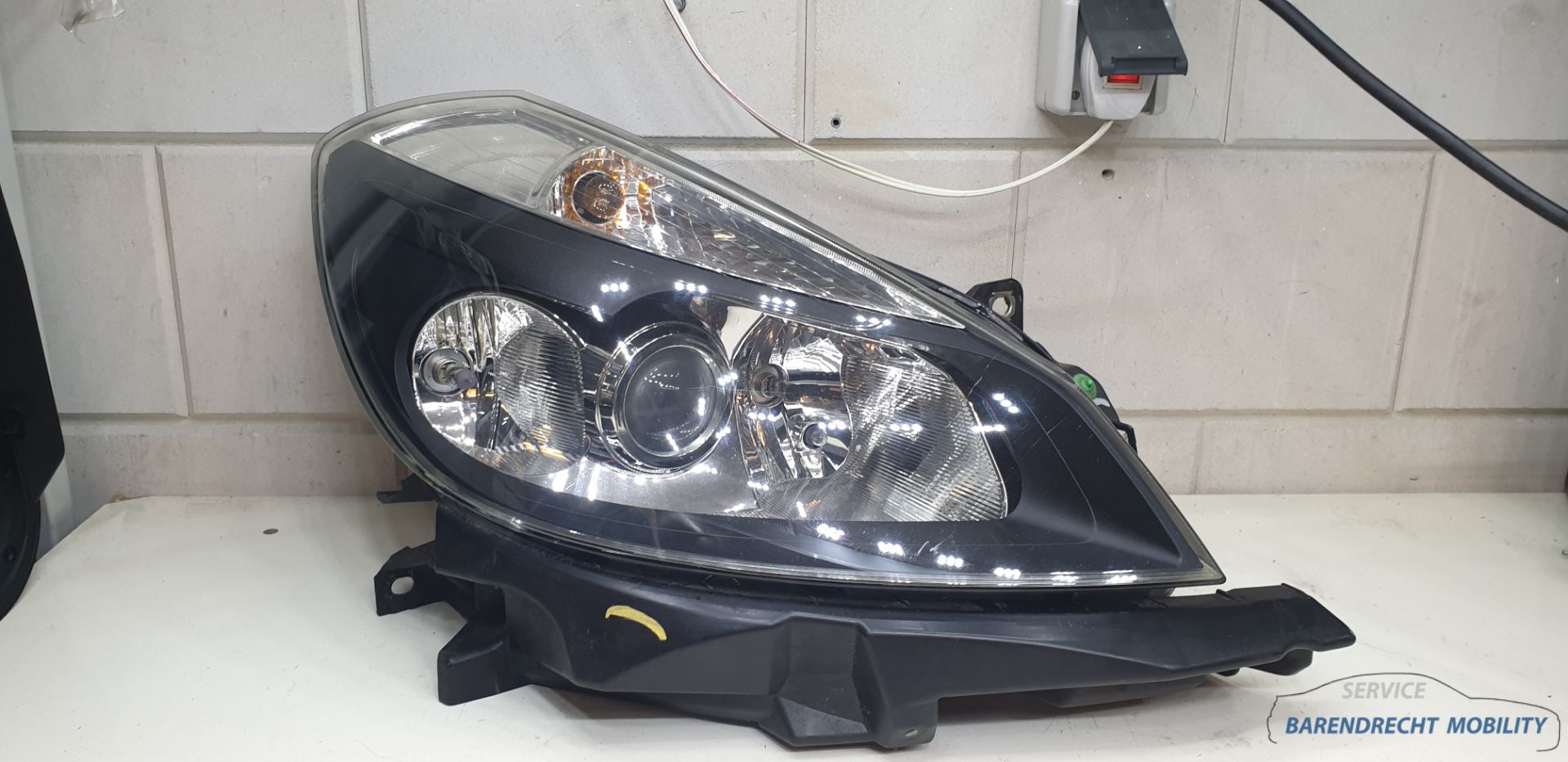 Koplamp Clio III Renault pre facelift rechts 8200261612 donkere inleg bochtverlichting 2006 / 2008