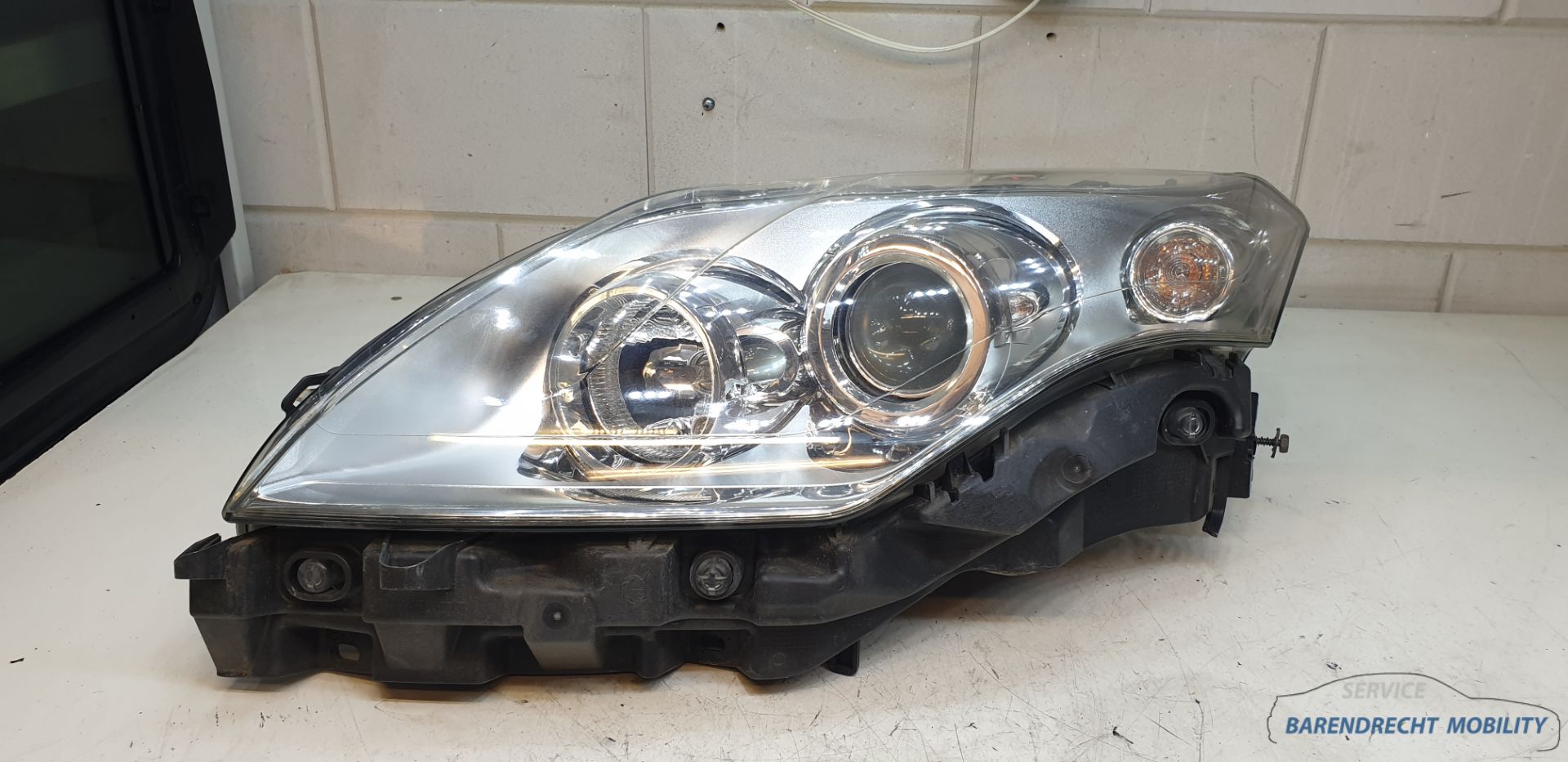 Koplamp links Laguna III Halogeen 260600033R bestuurderskant origineel gebruikt 2008 / 2012