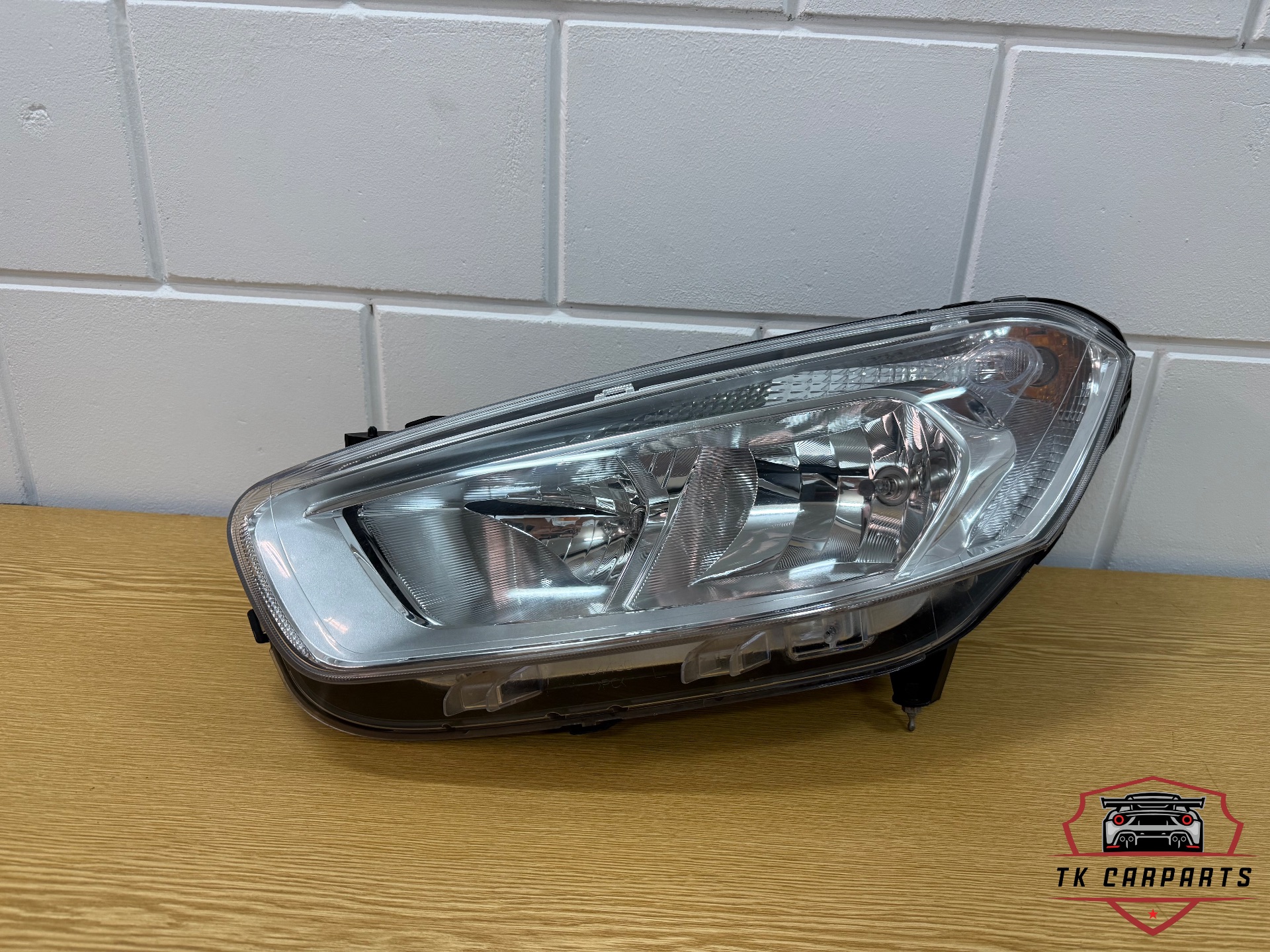 Ford transit courier halogeen koplamp L jt7613w030ad