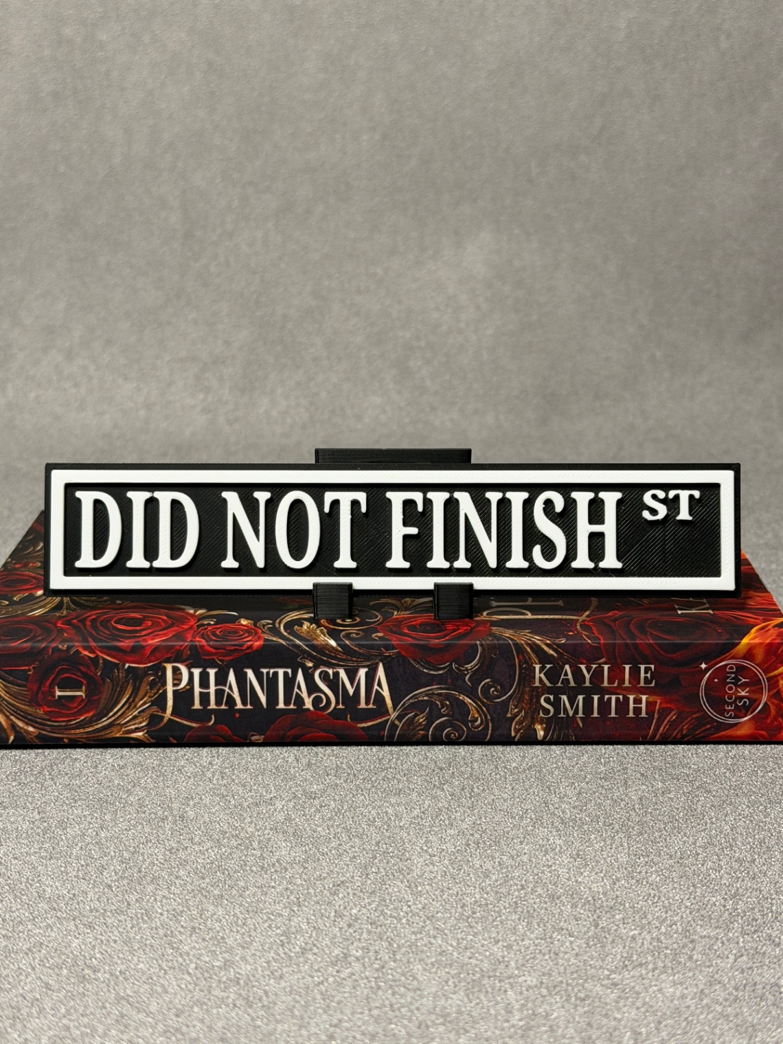 Lentynos ženklas „Did not Finished“ - 2
