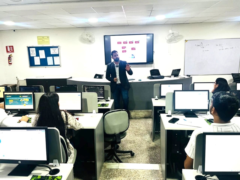 Front view of a training session in a classroom.