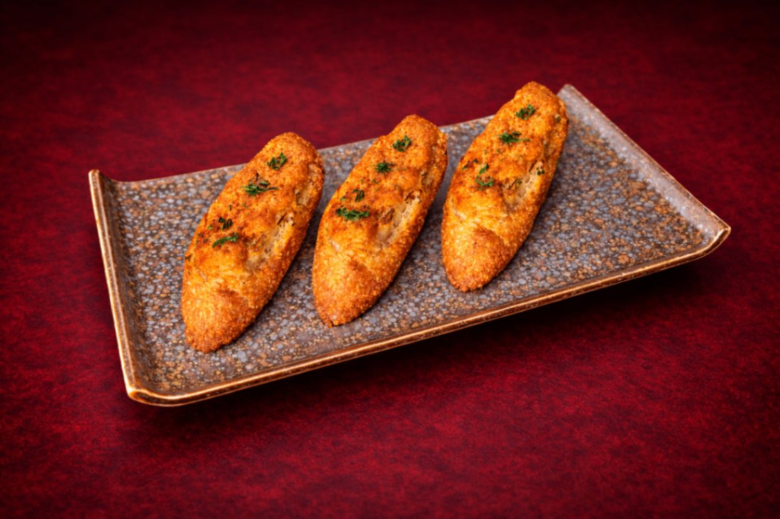 博多明太子軟法（Mentaiko Bruchetta）｜1884 Taipei 開胃菜，NT$ 240・濃郁博多明太子抹醬，鹹香微辣，搭配酥烤軟法層次豐富。

