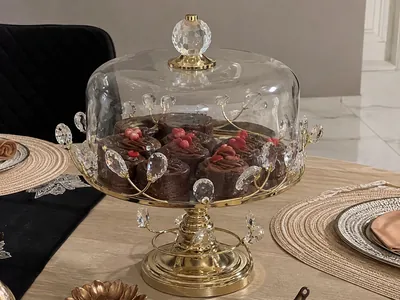 Glass stand with gold base and crystals