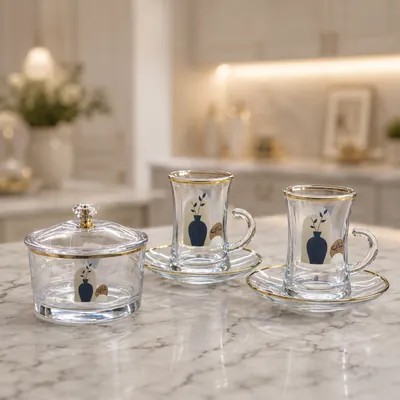 Gilded tea set with floral motifs