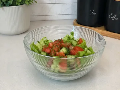 Clear glass salad bowl with gold rim