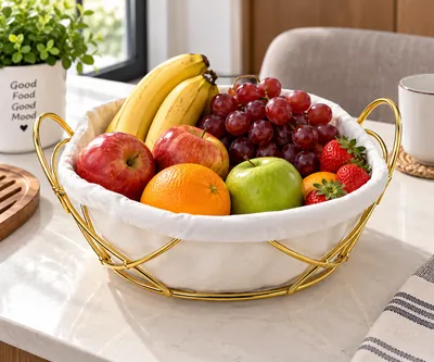 Iron bread basket with gold handles and white fabric