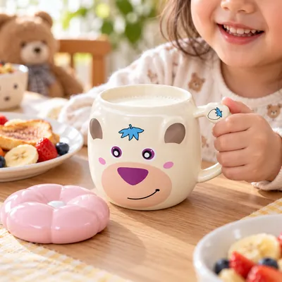 Ceramic mug with animal illustrations