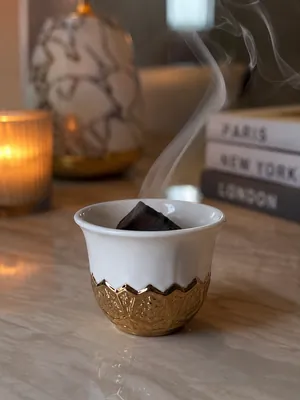 Porcelain coffee cup set with gold base