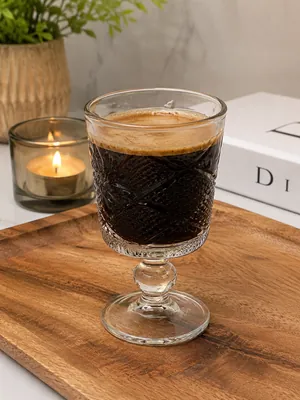Glass cup with a gold base