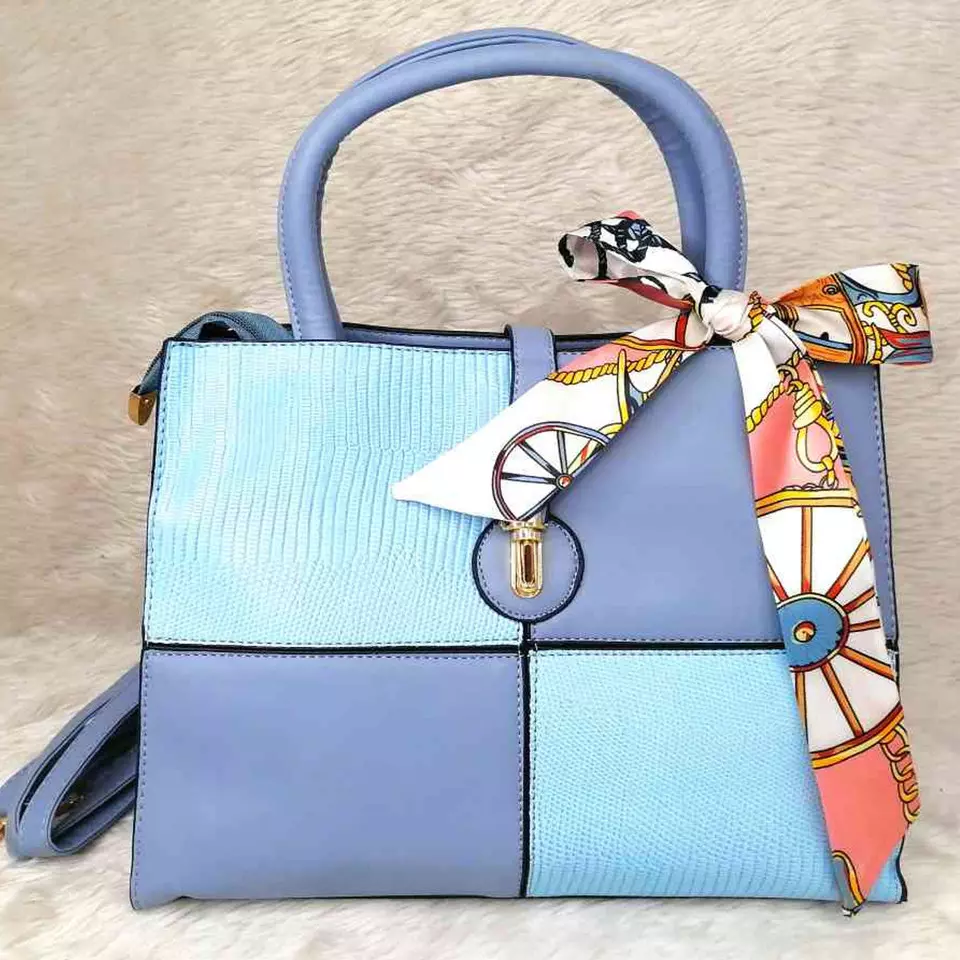 0 - bolsa para mujer modelo adelina color azul claro con azul marino