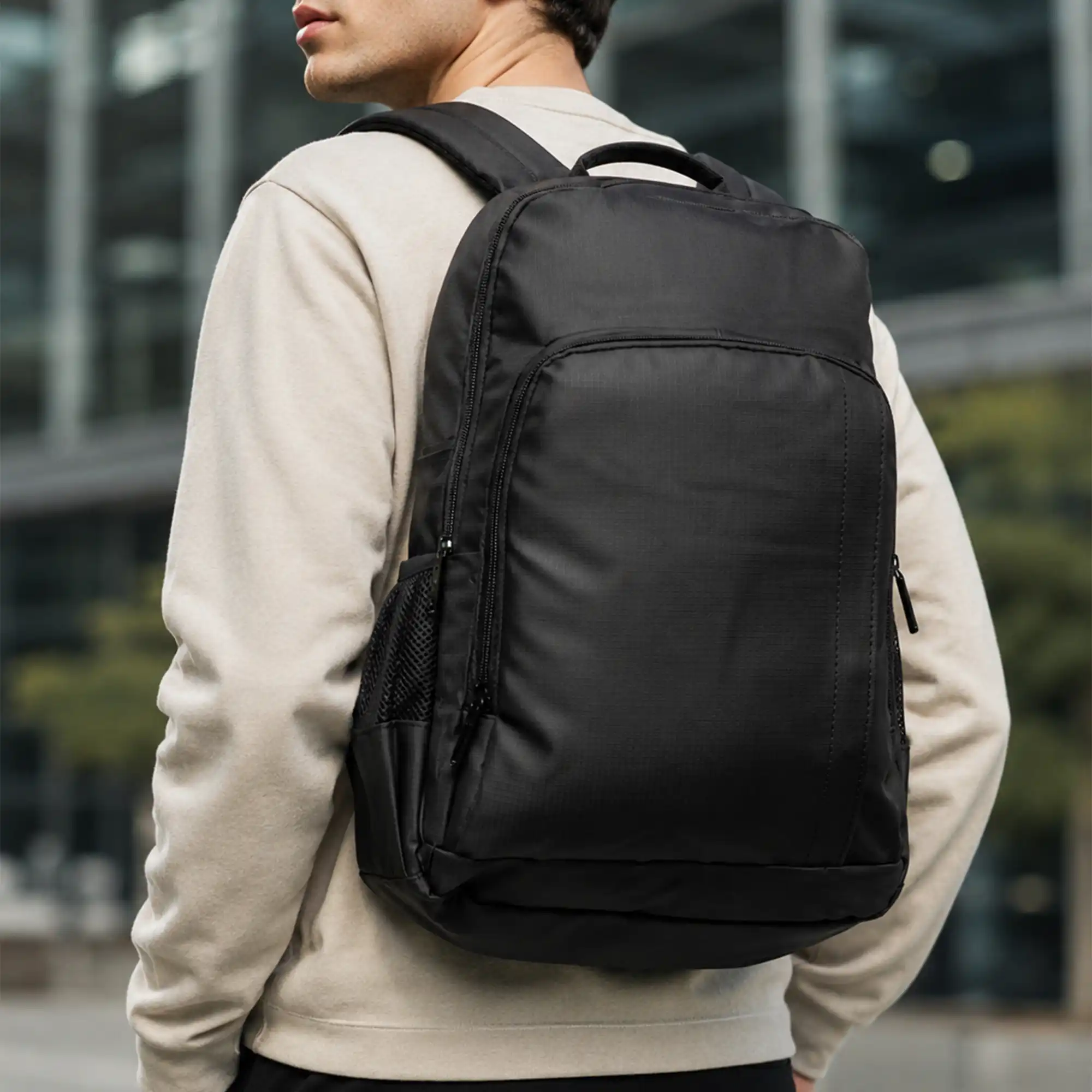 Black laptop backpack with USB charging port and professional design