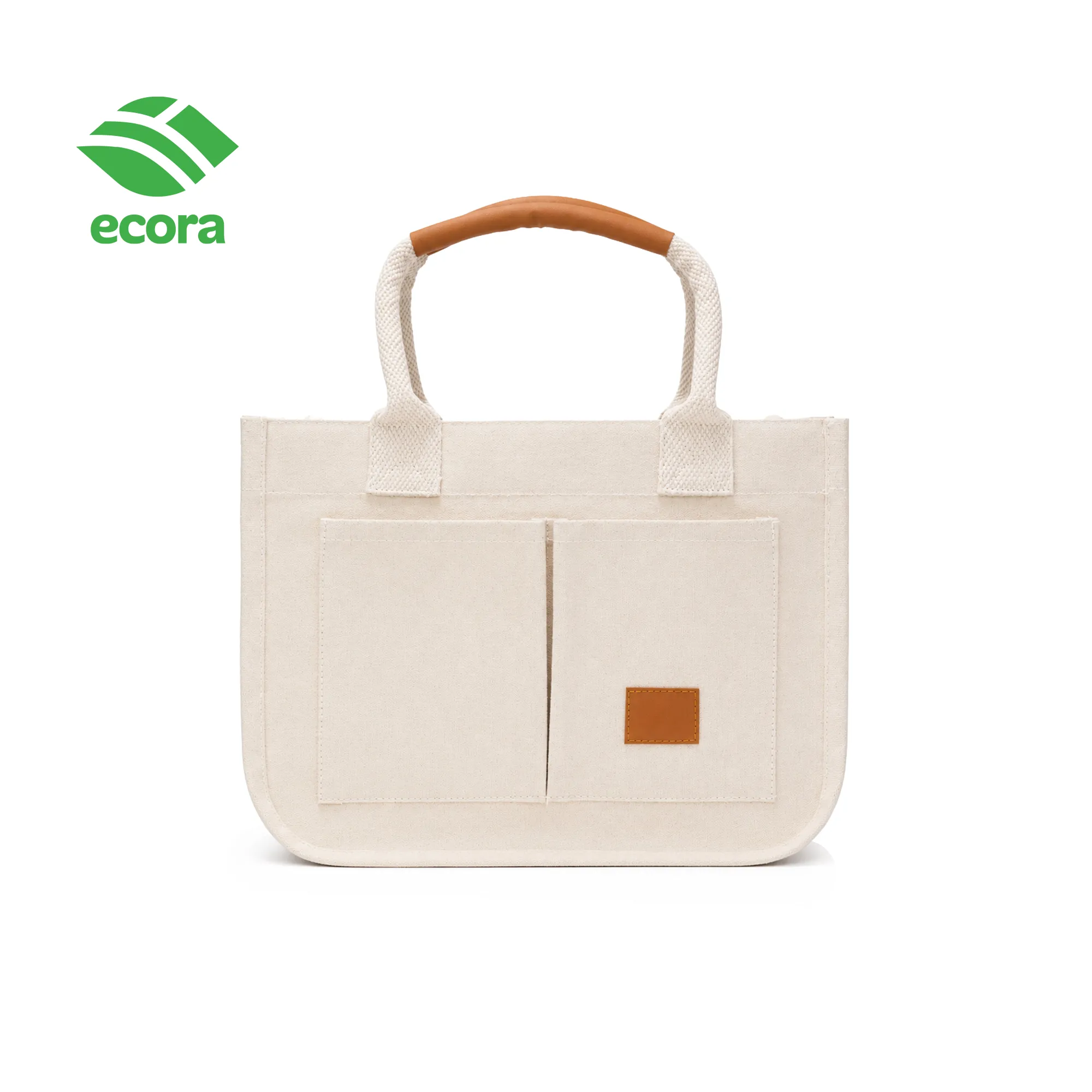 Canvo tote showing its twin front pockets and structured flat base