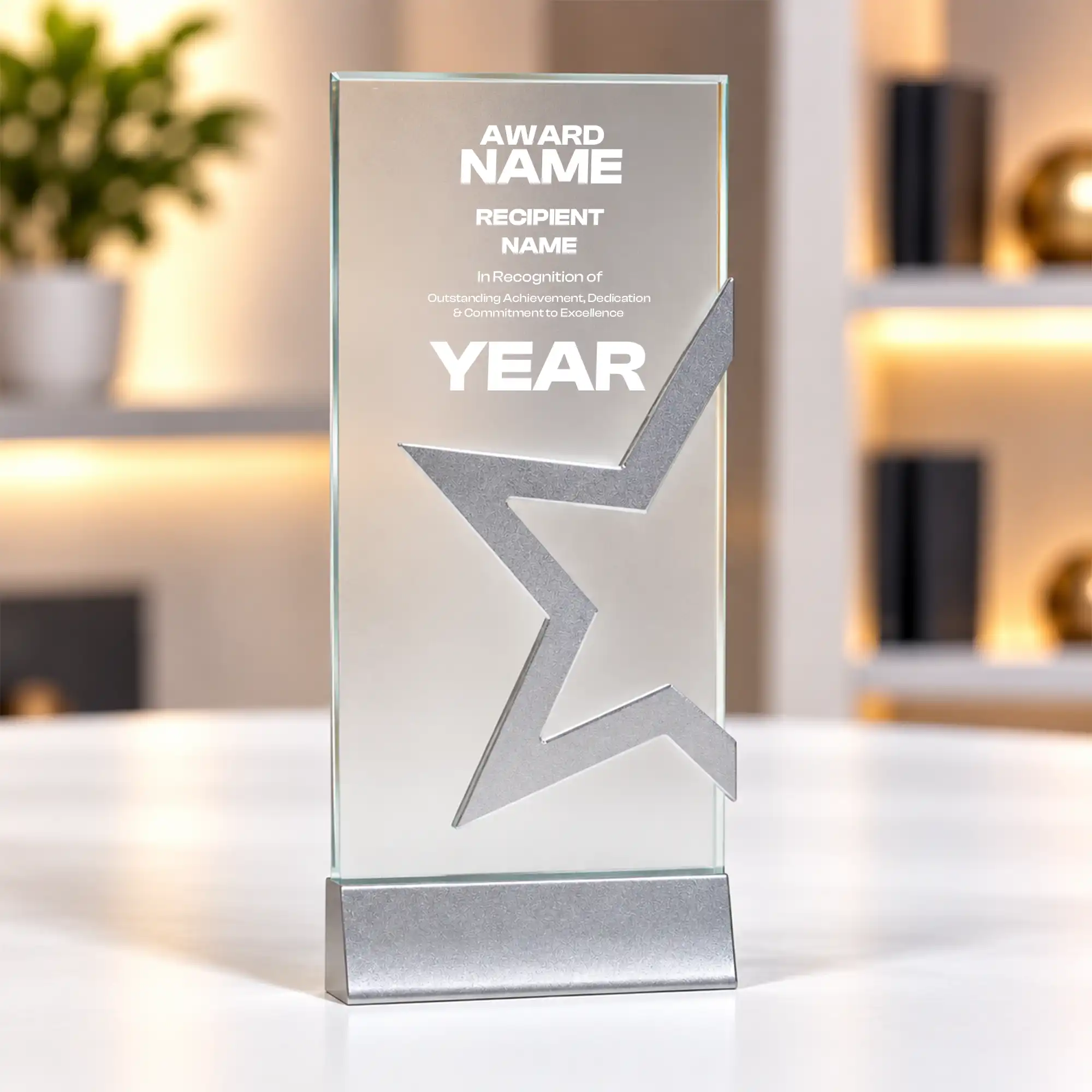 Silver star crystal award column on a desk