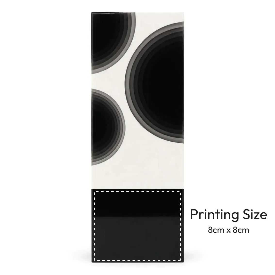 Two-tone crystal award with black orbit circle motif on white face