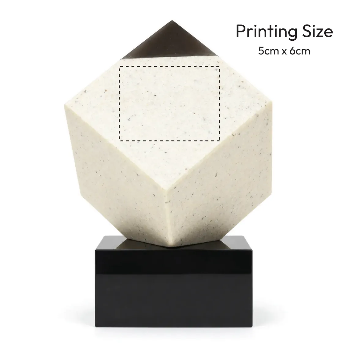 Diamond corner crystal cube on a black base on a desk