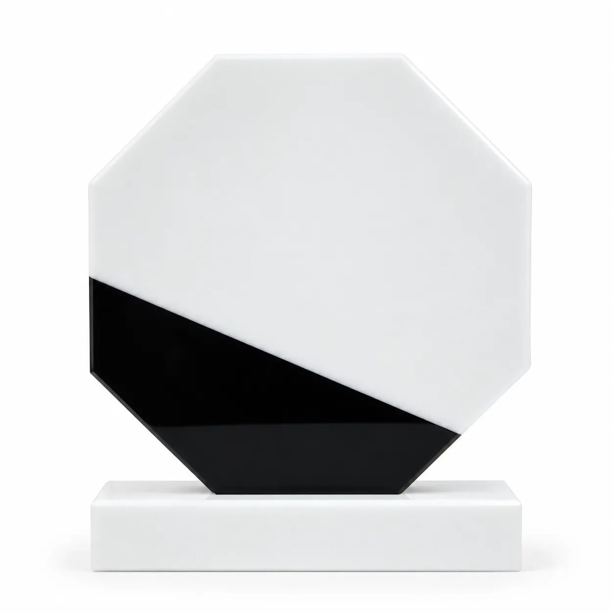 White marble octagonal crystal award on a desk