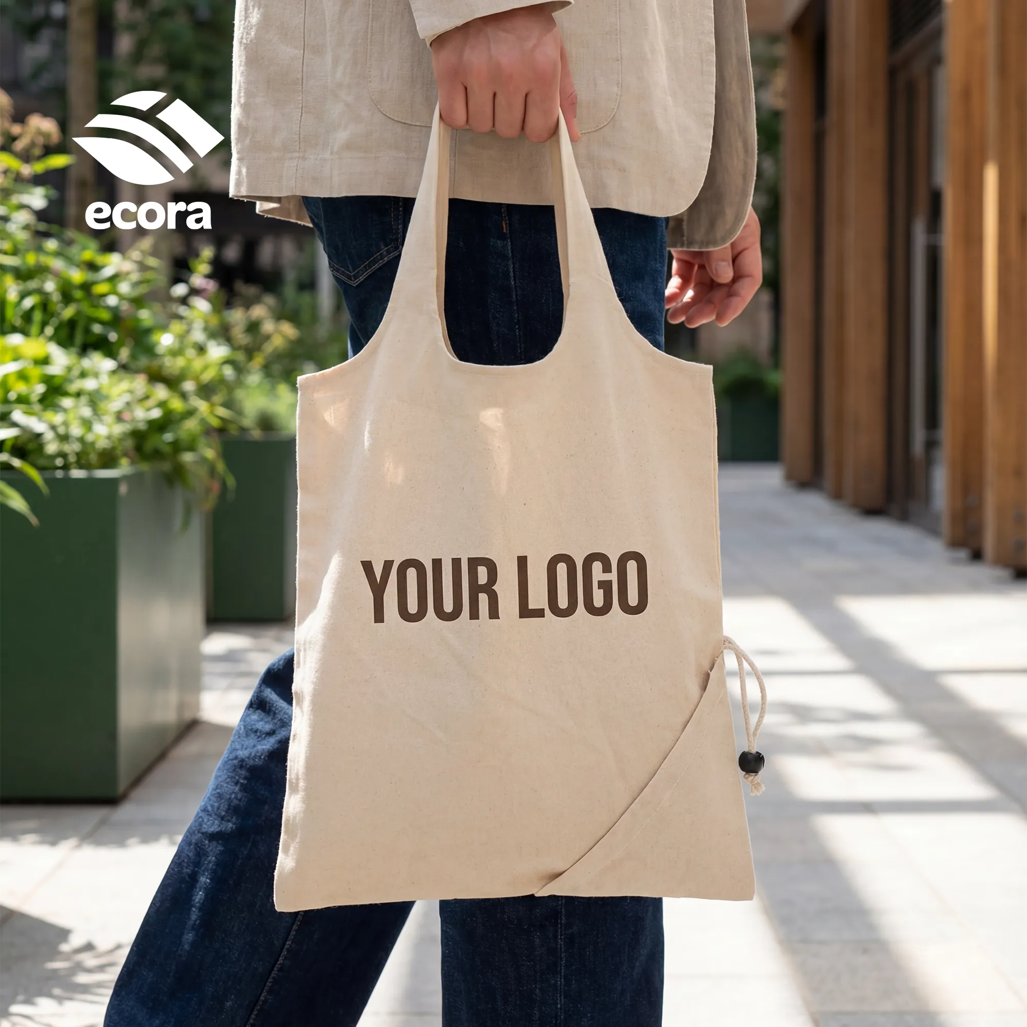 Folva foldable canvas shopping bag opened to full size with the front logo area visible