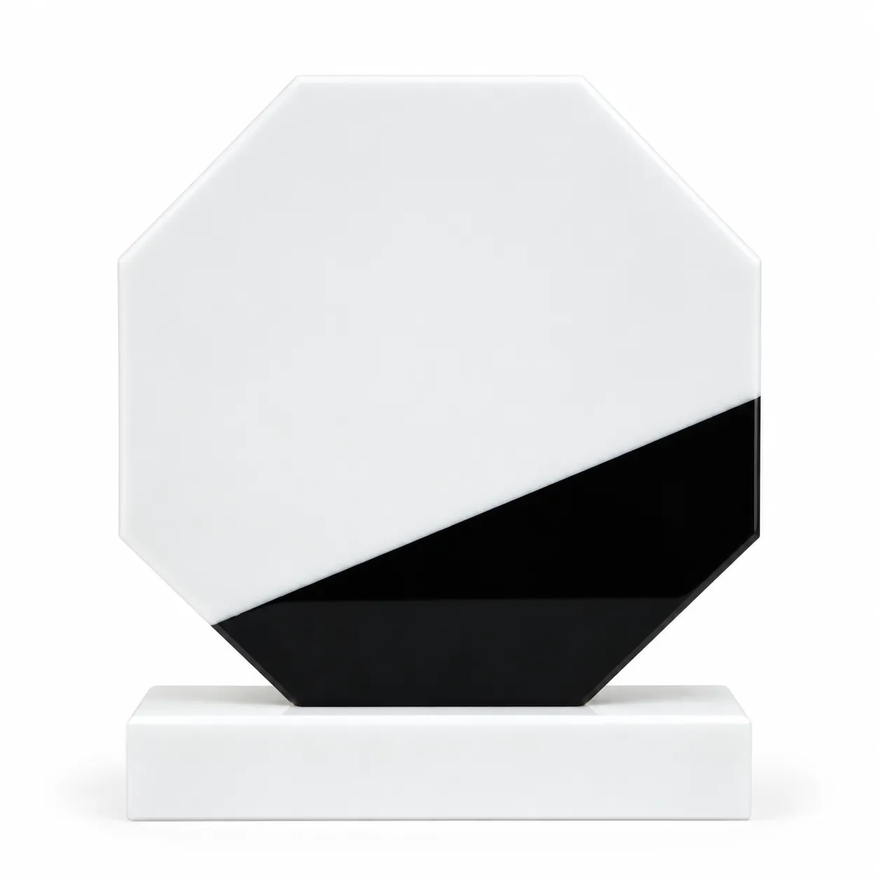 White marble octagonal crystal award on a desk