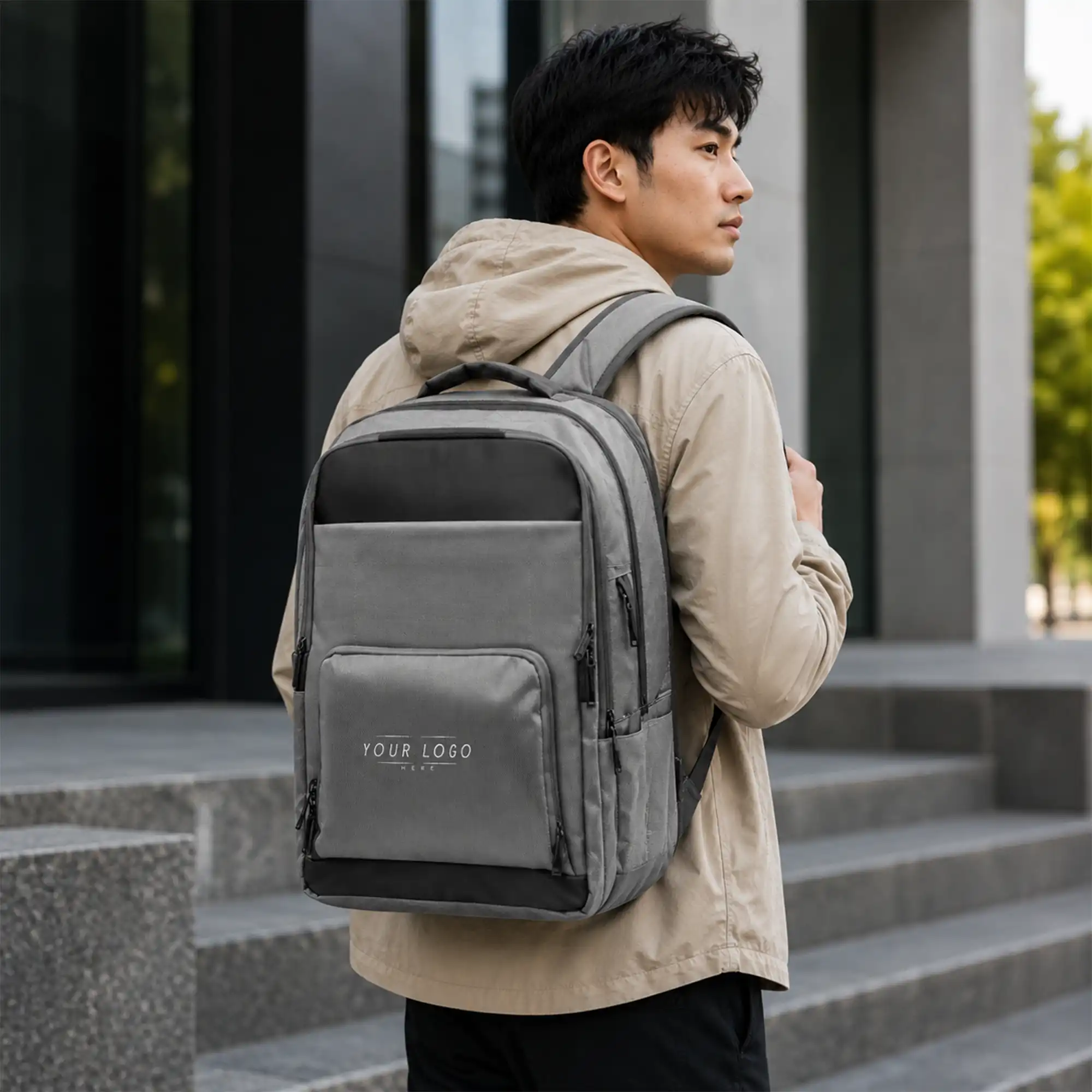 Gray executive laptop backpack with USB charging port and multiple compartments