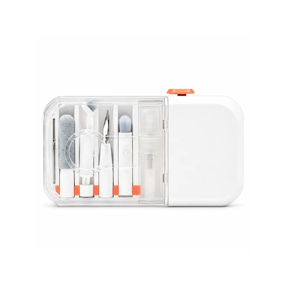 Smartphone resting on the fold-out phone holder of a white gadget cleaning kit