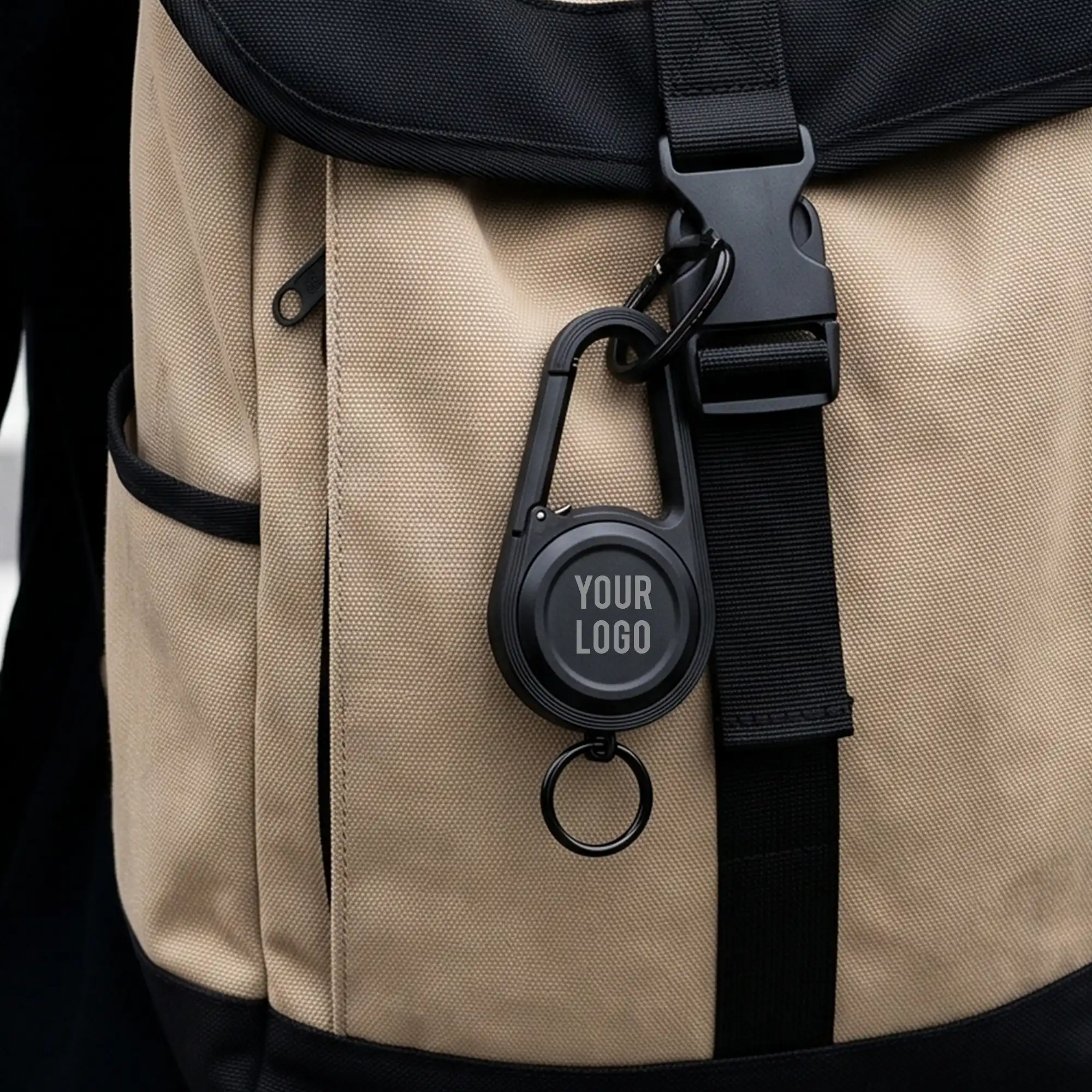 Latchex carabiner Bluetooth finder shown open with keyring, rotating cap and clip
