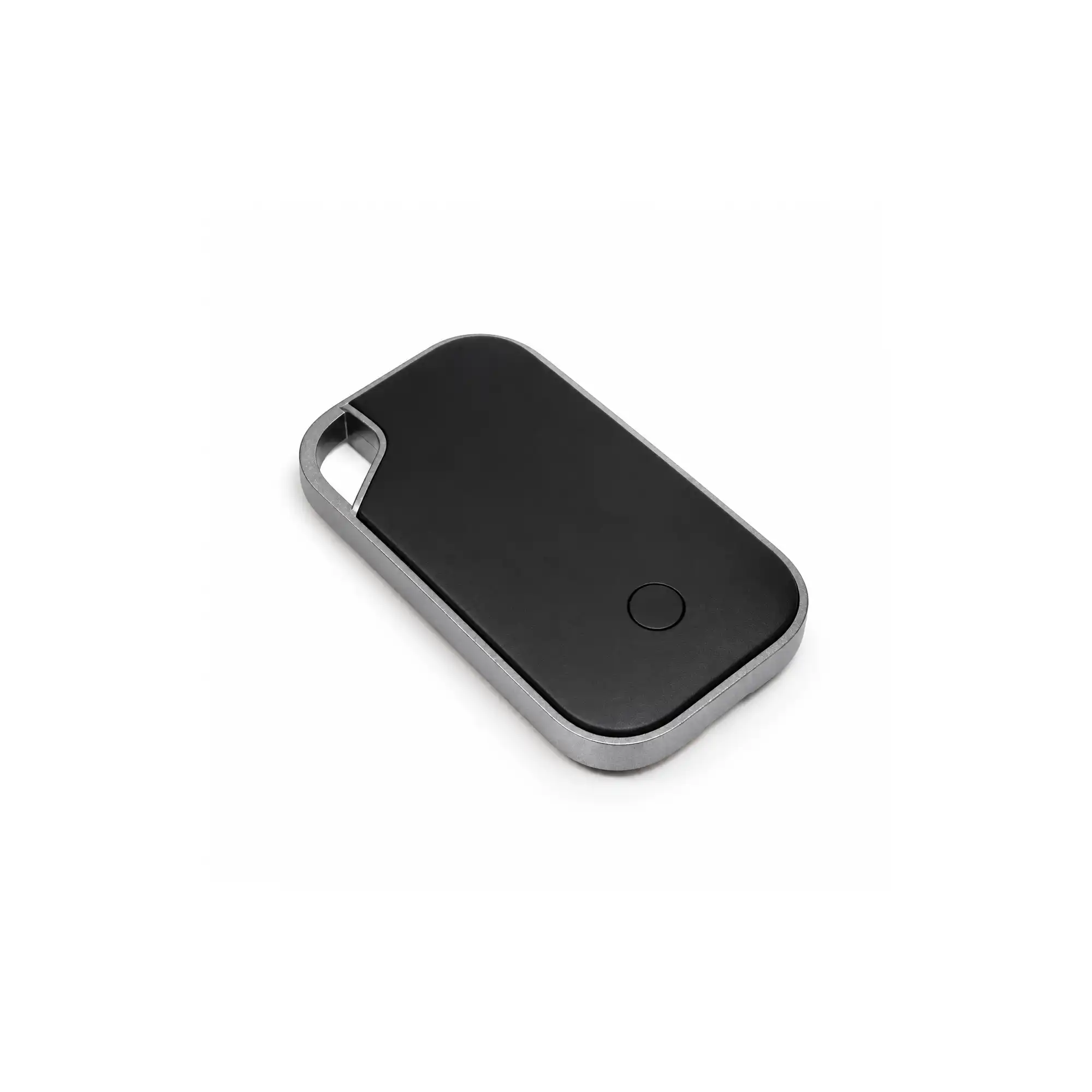 Traxo Bluetooth locator device, black panel with silver metal frame, front view
