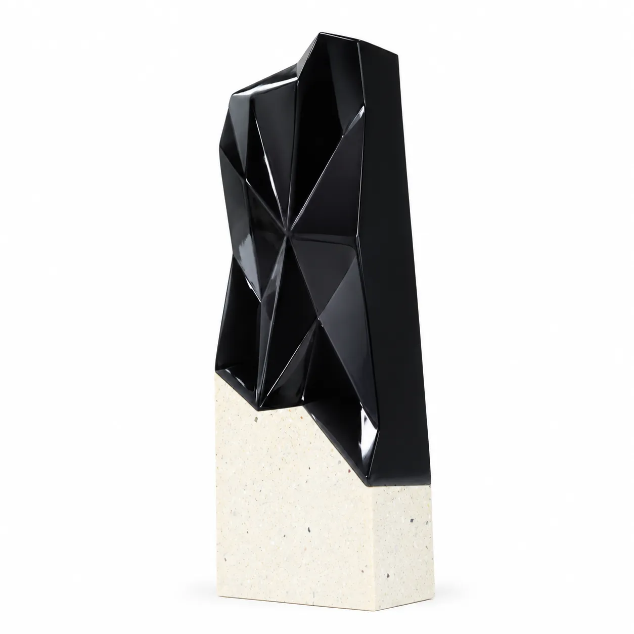Black faceted prism crystal award on a cream base