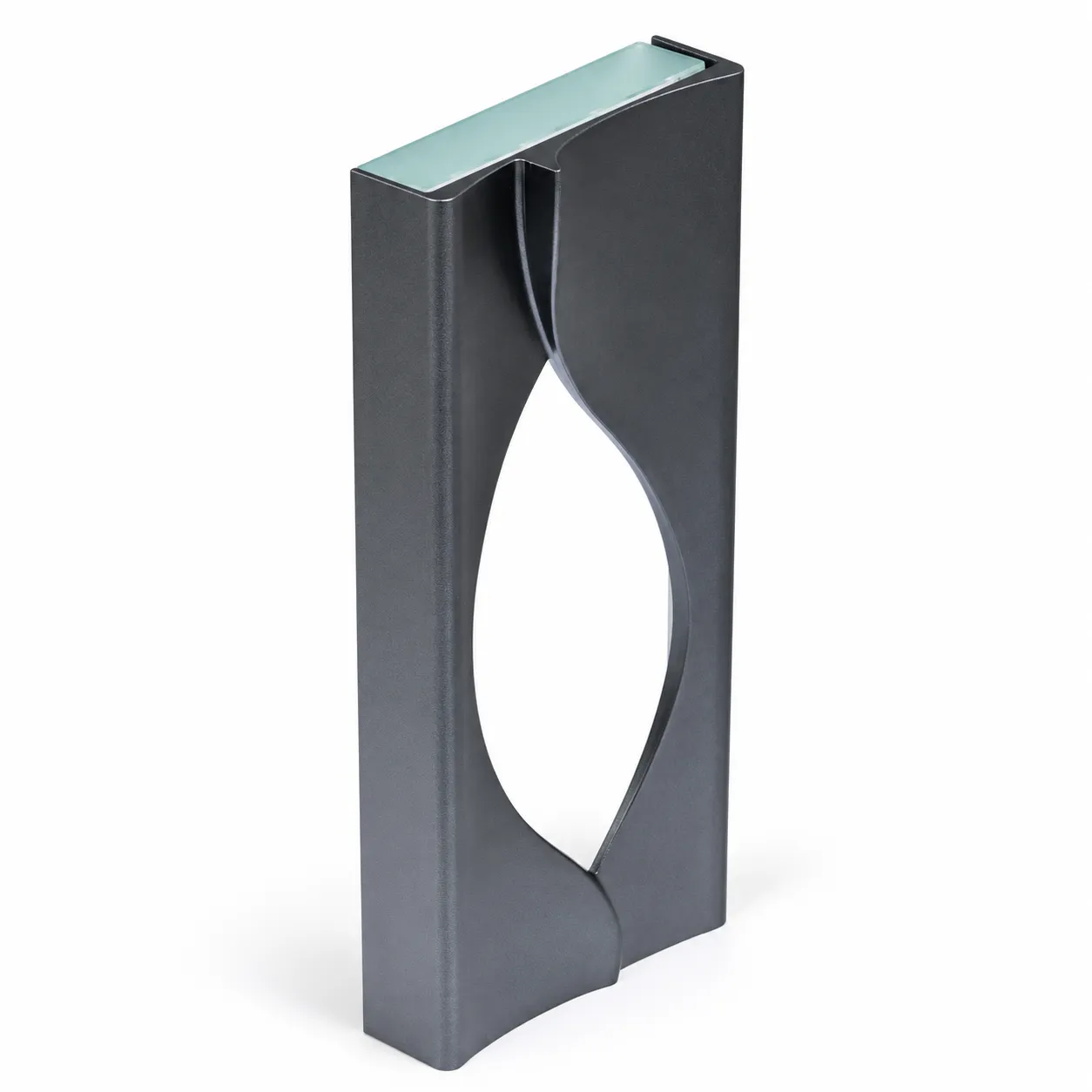 silver oval accent crystal award standing upright on a desk