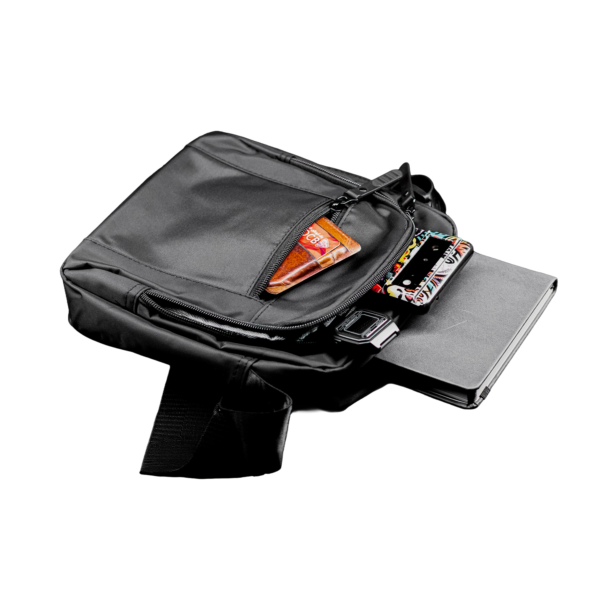 Premium black sling bag with adjustable strap and multi-compartment travel design
