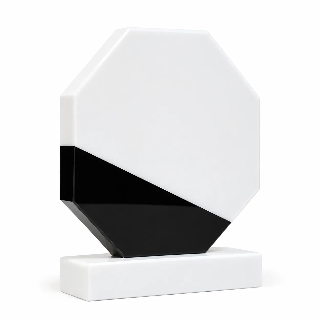White marble octagonal crystal award on a desk