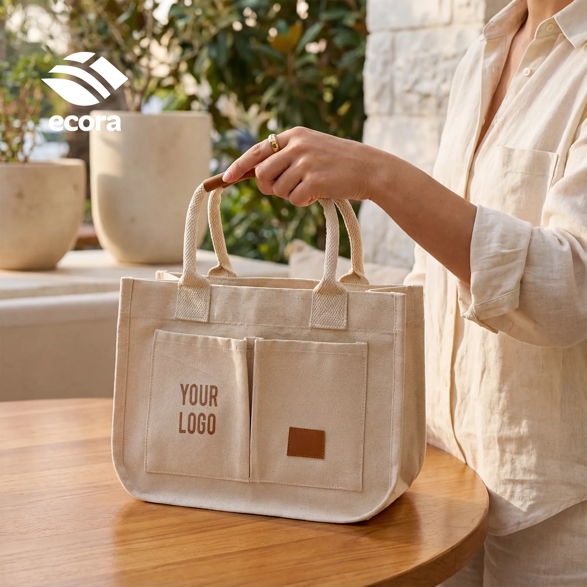 Canvo laminated canvas tote in natural with leather handles