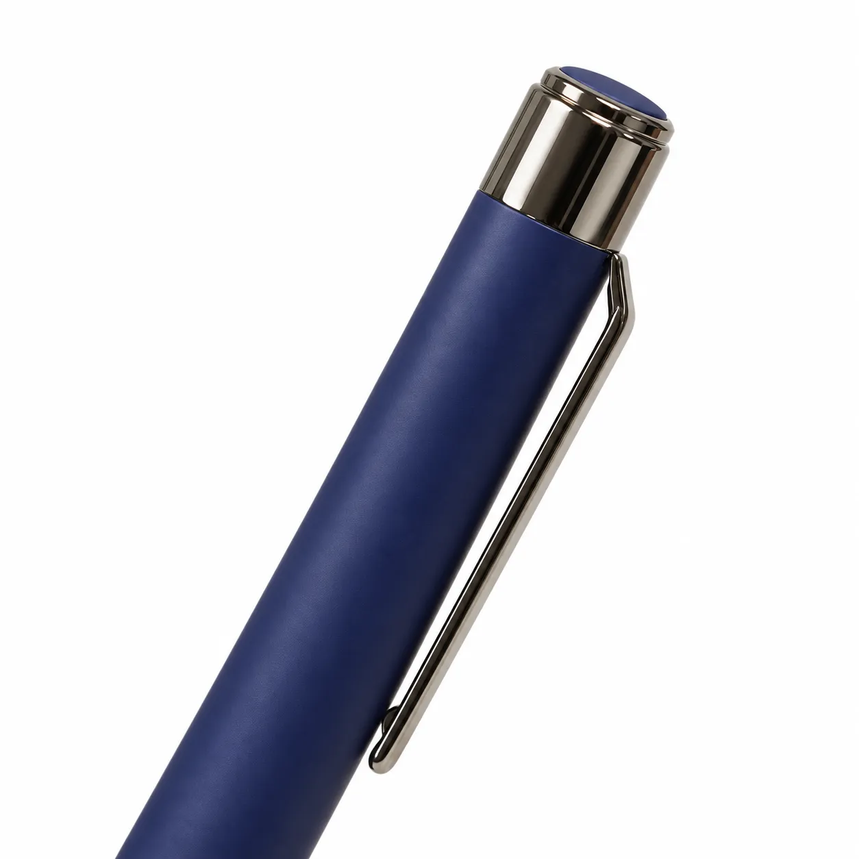 Blue matte metal ballpoint pen with gunmetal clip and bullet tip on white