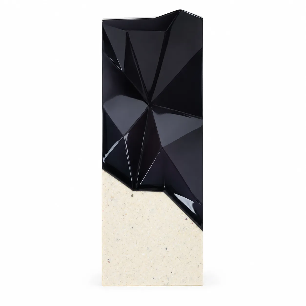 Black faceted prism crystal award on a cream base