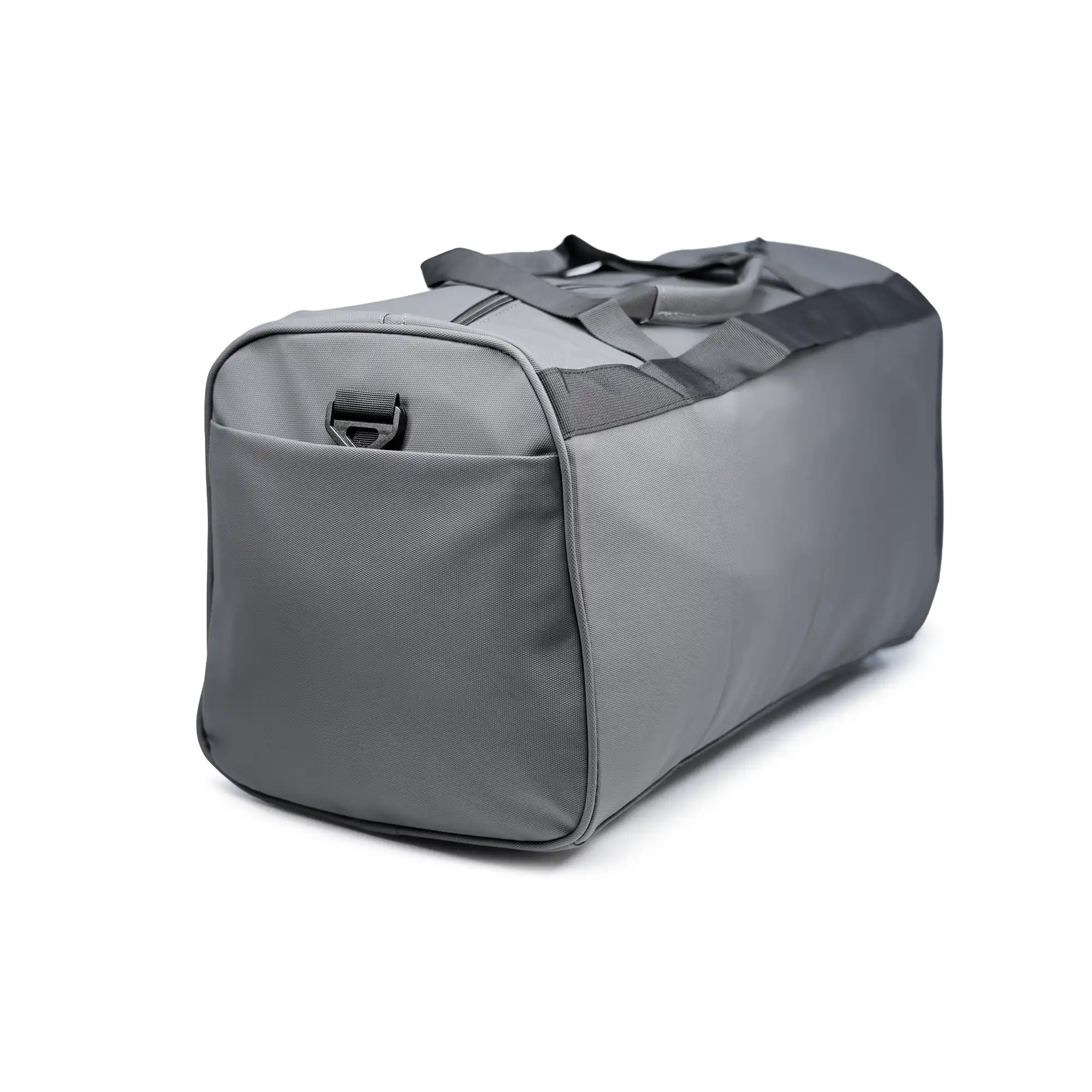 Modern gray duffle travel bag with dual handles and adjustable strap