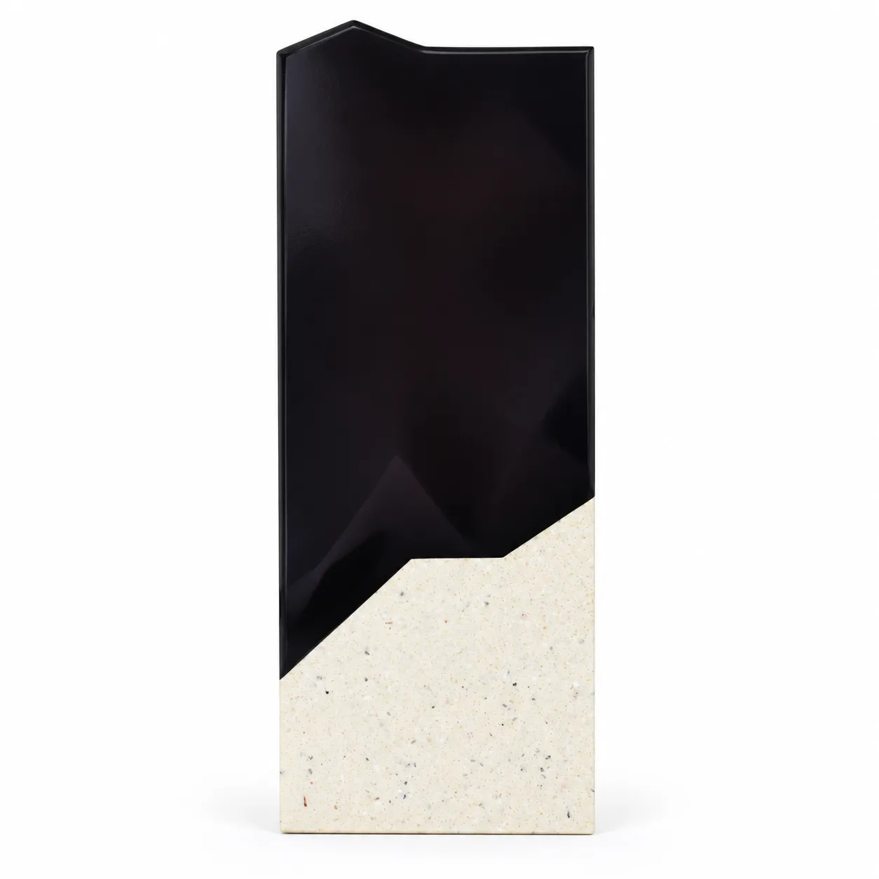 Black faceted prism crystal award on a cream base