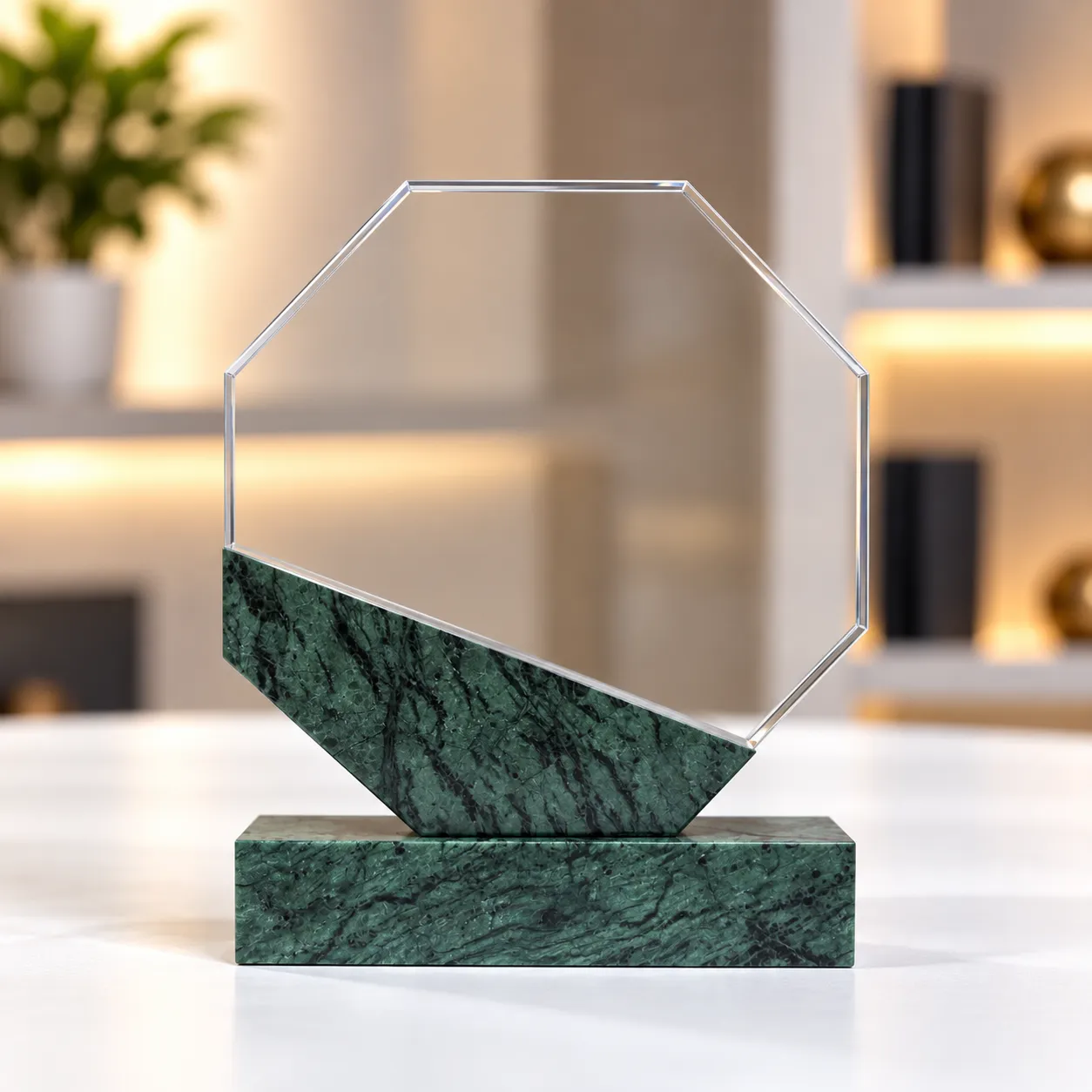 Green marble octagonal crystal award on a desk
